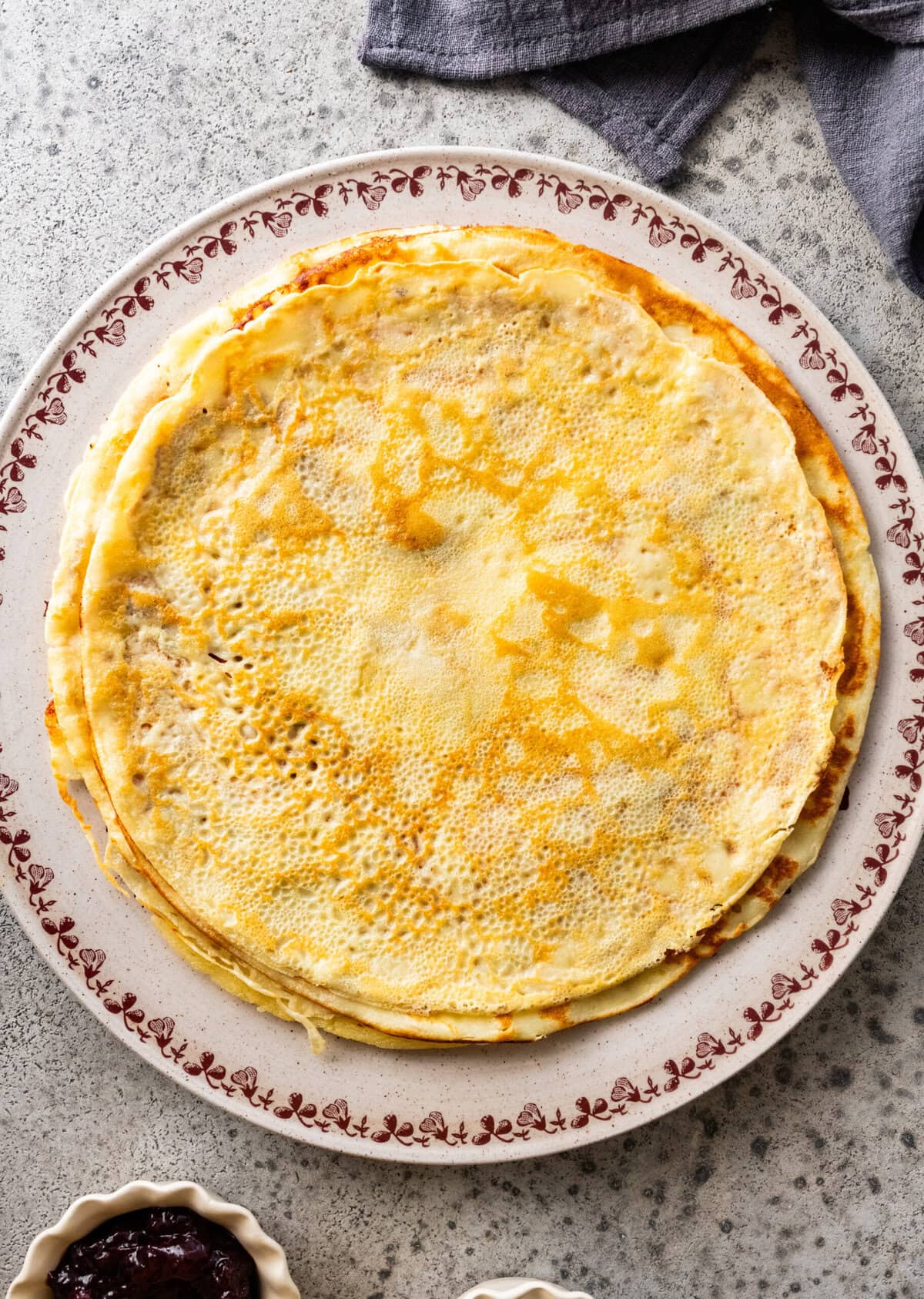 swedish pancakes on a plate.