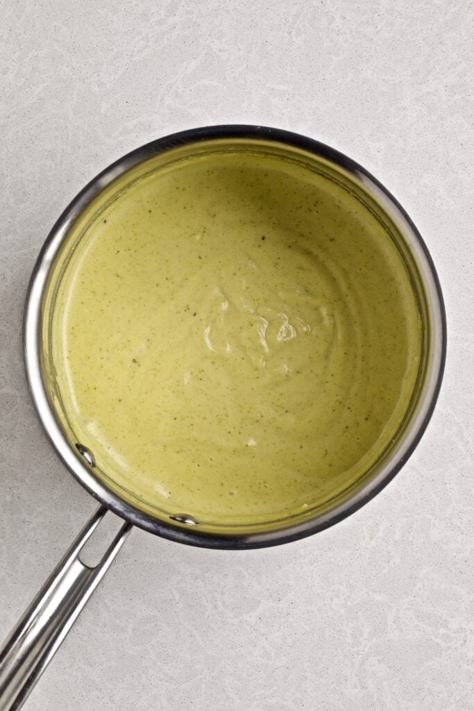 Italian pistachio cream in a saucepan.