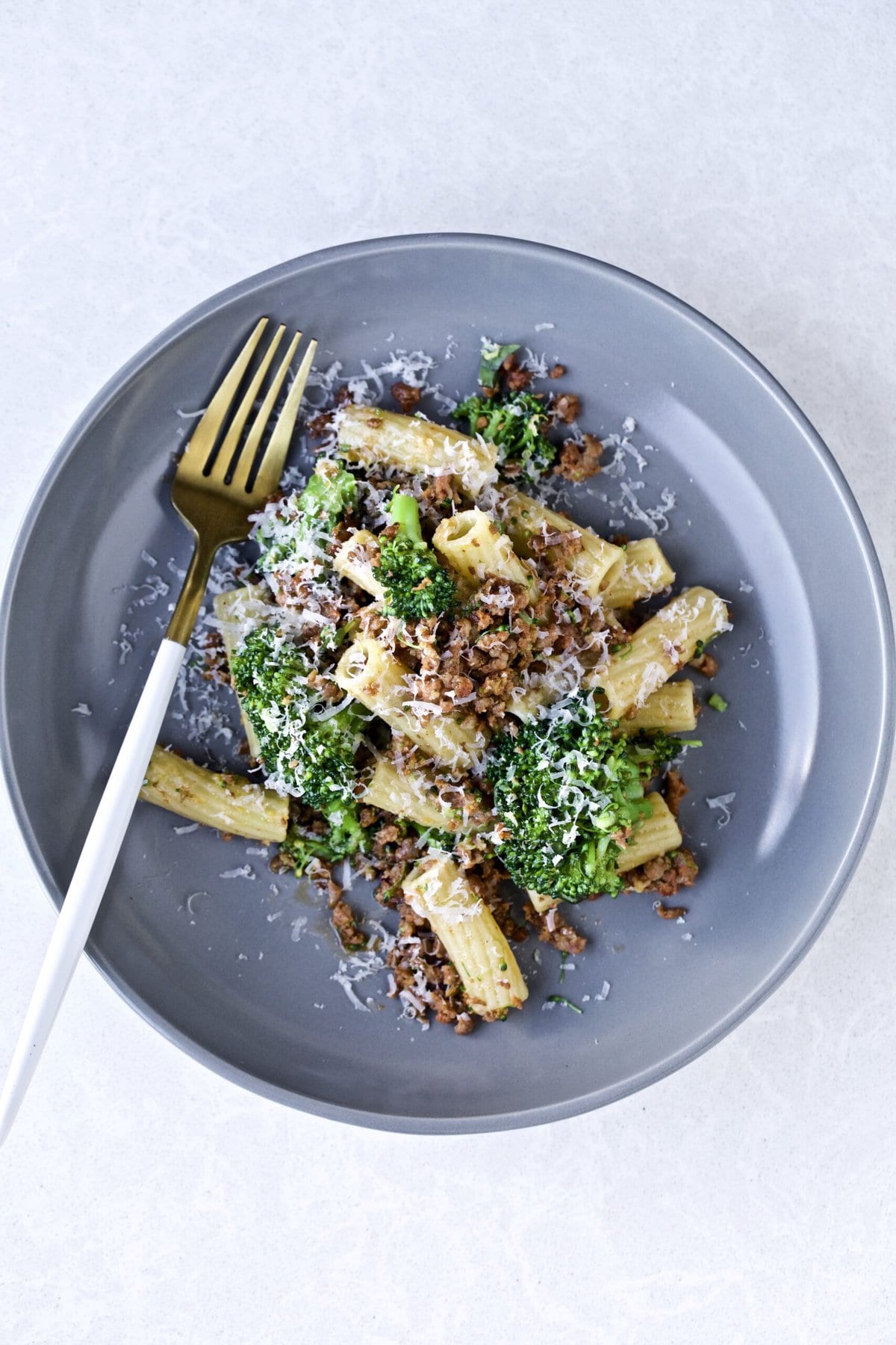 Broccoli Pasta with Sausage Recipe (Italian)- on a plate with a fork.