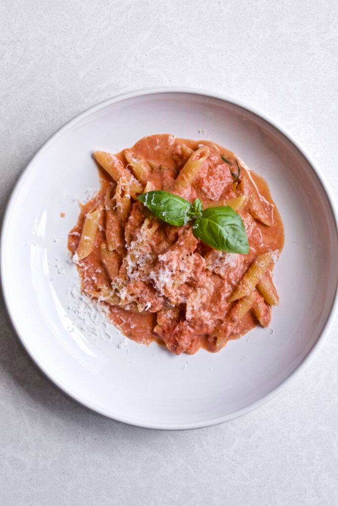 Penne in pink sauce on a plate. 