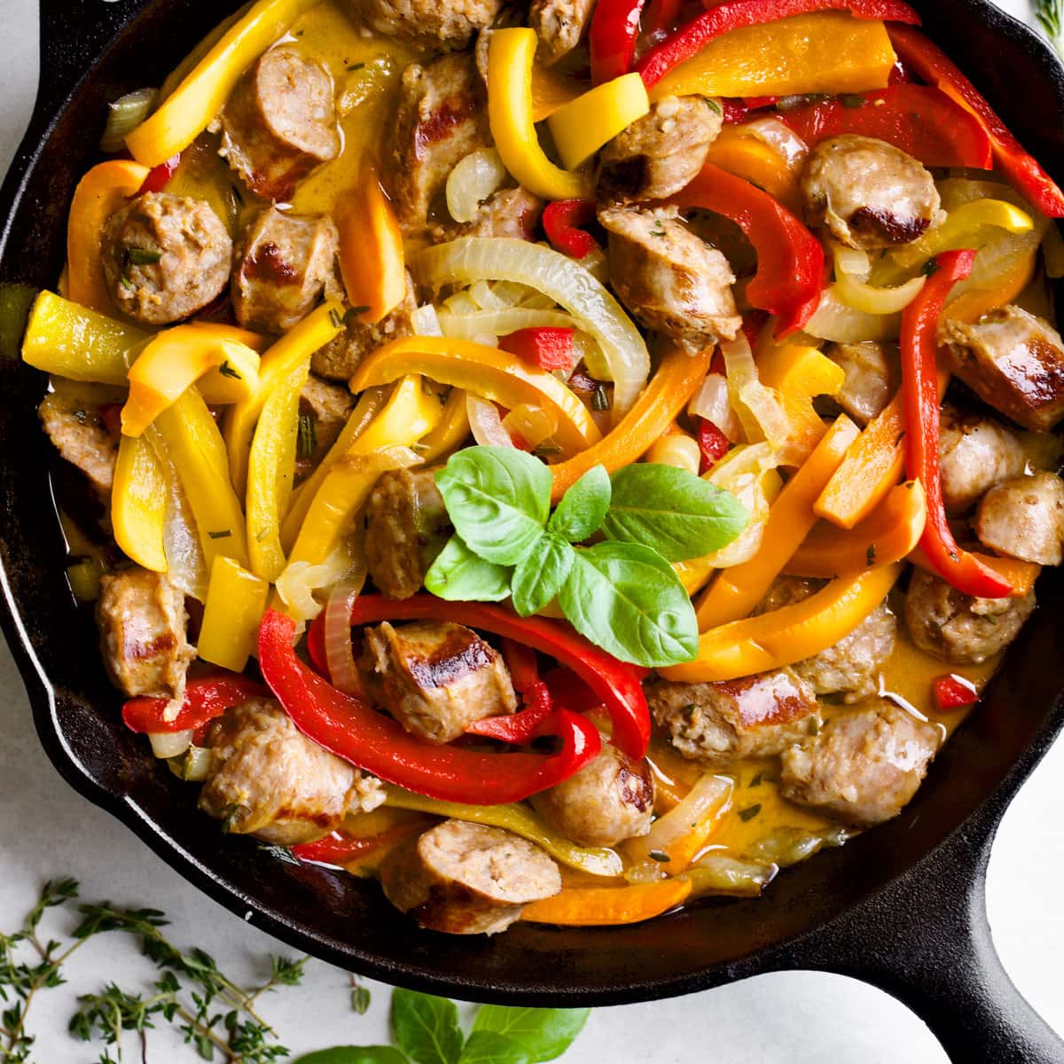 Italian sausage and peppers in cast iron skillet