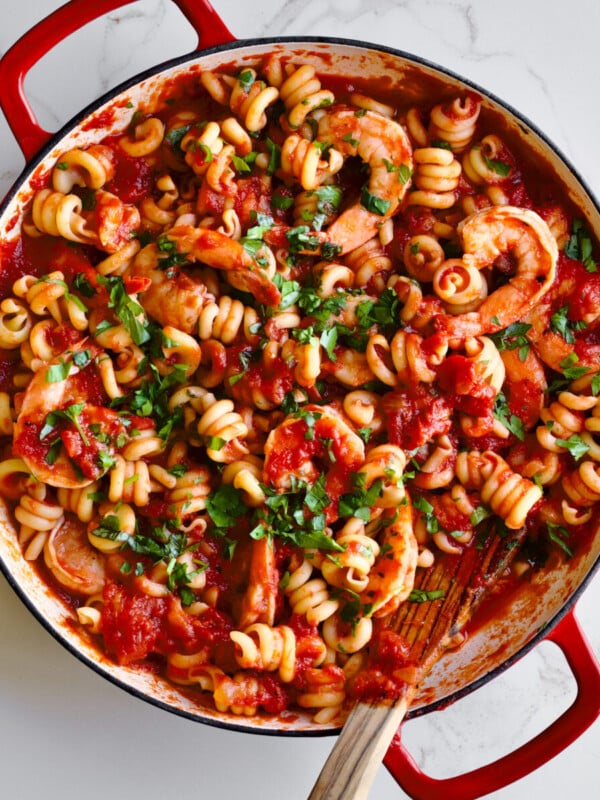 Trottole Pasta Recipe with Tomato Sauce and Shrimp in red enamel pan