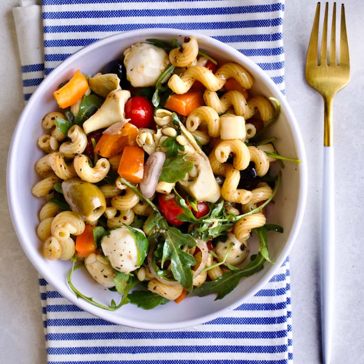 Antipasto Pasta Salad Recipe (with Italian Dressing) in a bowl with a fork