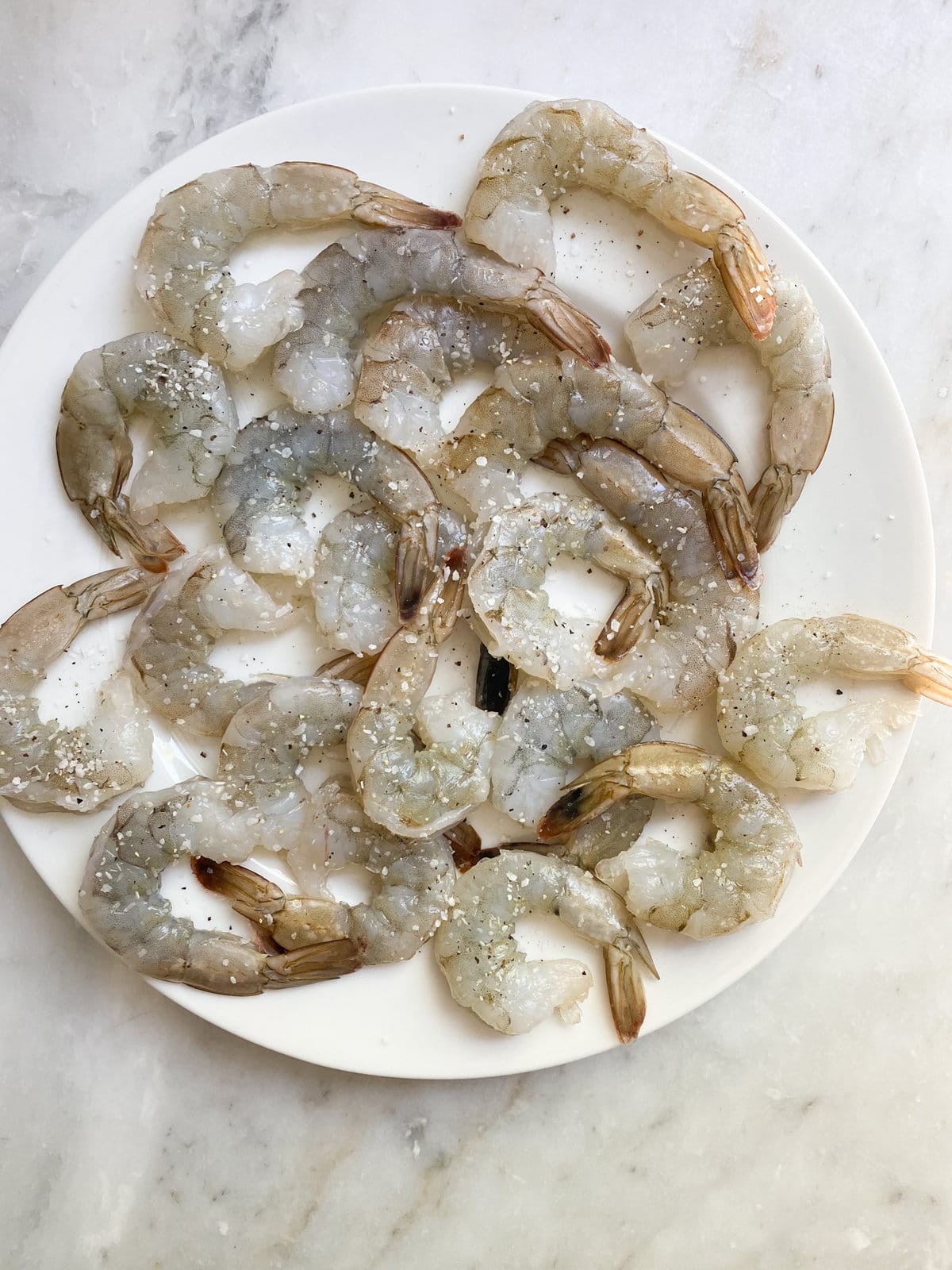 seasoned shrimp before cooking 