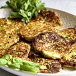 Best Italian Zucchini Fritters (easy recipe) on a platter for serving.