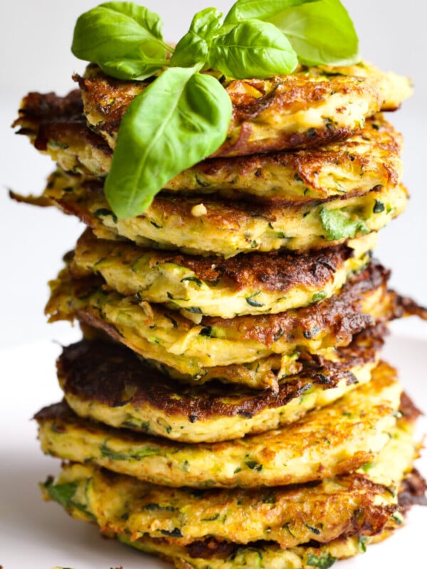 stack of zucchini fritters on a plate