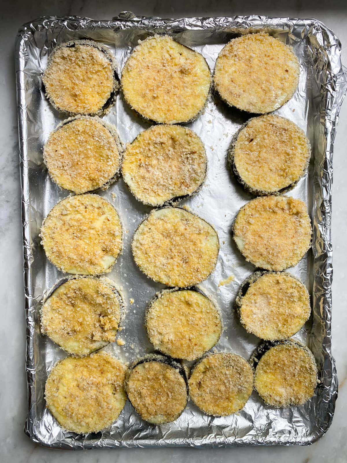 Baked eggplant slices with ricotta cheese- baking slices. 