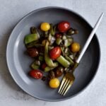Italian flat green beans on a plate with a fork.