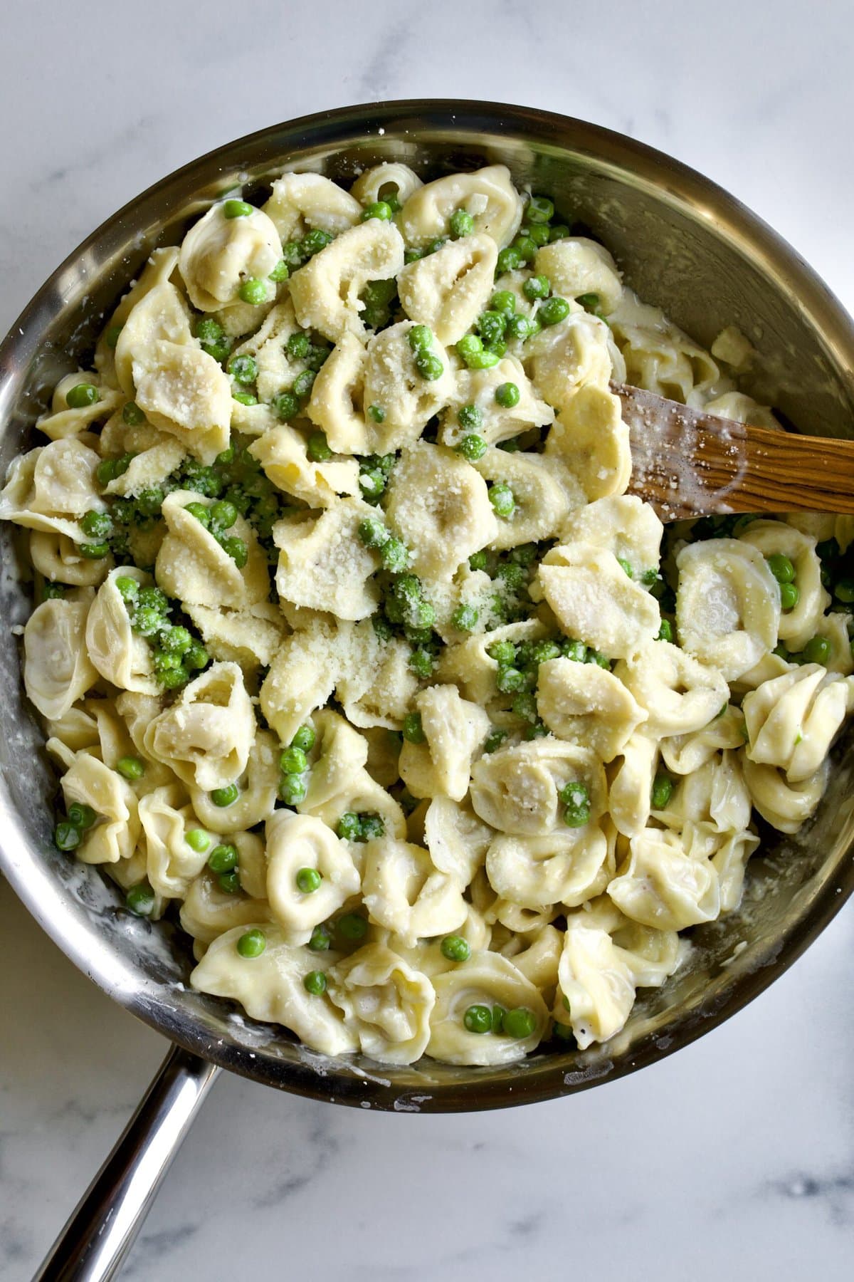 skillet pan with Tortellini Alla Panna Recipe with Peas