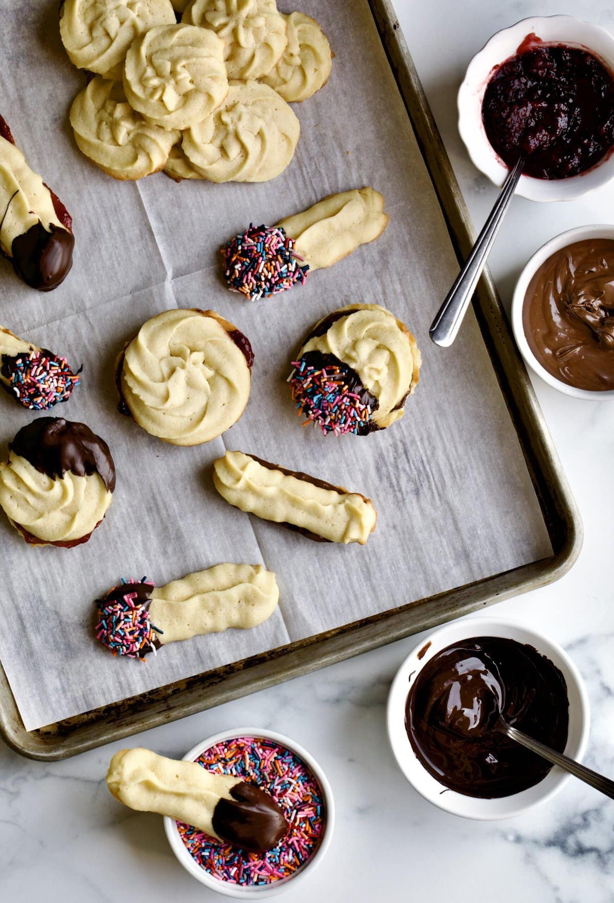 tray of Italian butter cookies with chocolate and jam 