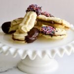 Italian butter cookies on a cake platter.