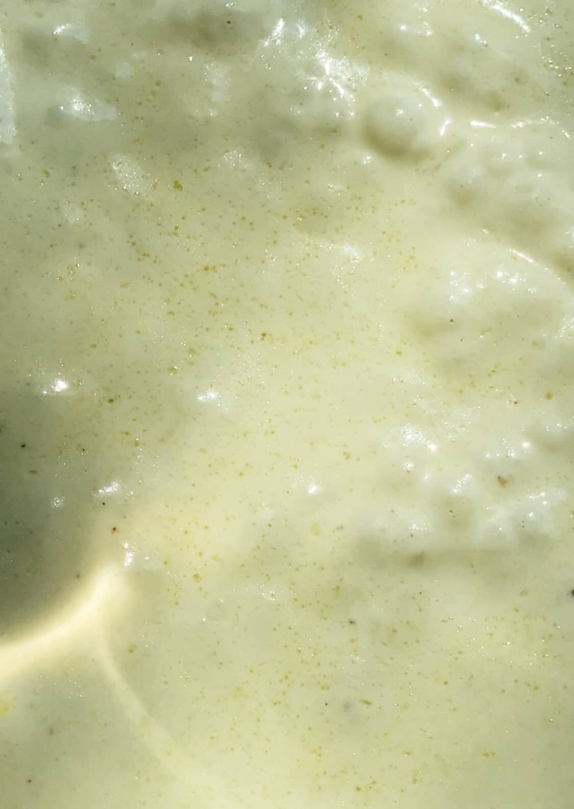 cream sauce boiling process photo.