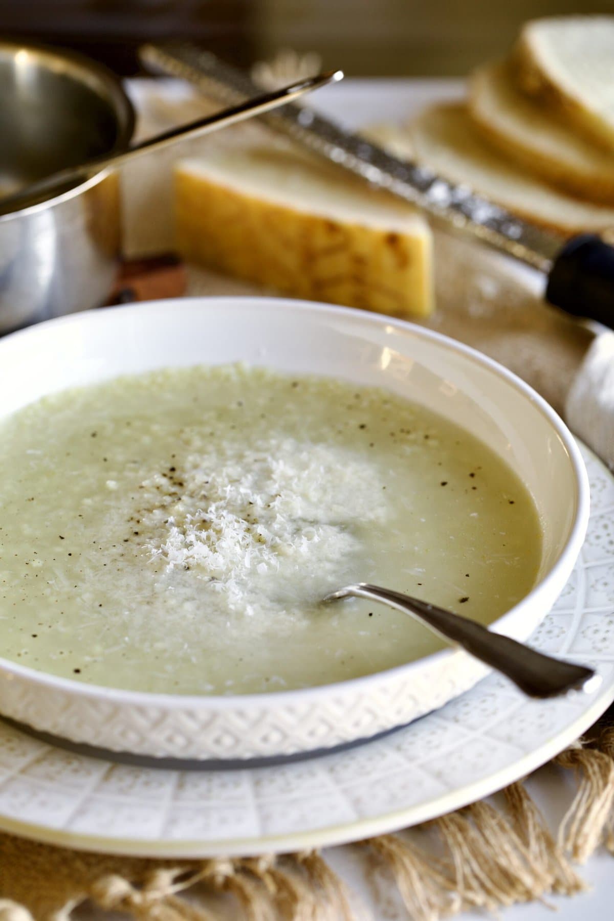 pastina soup in a bowl with spoon. 