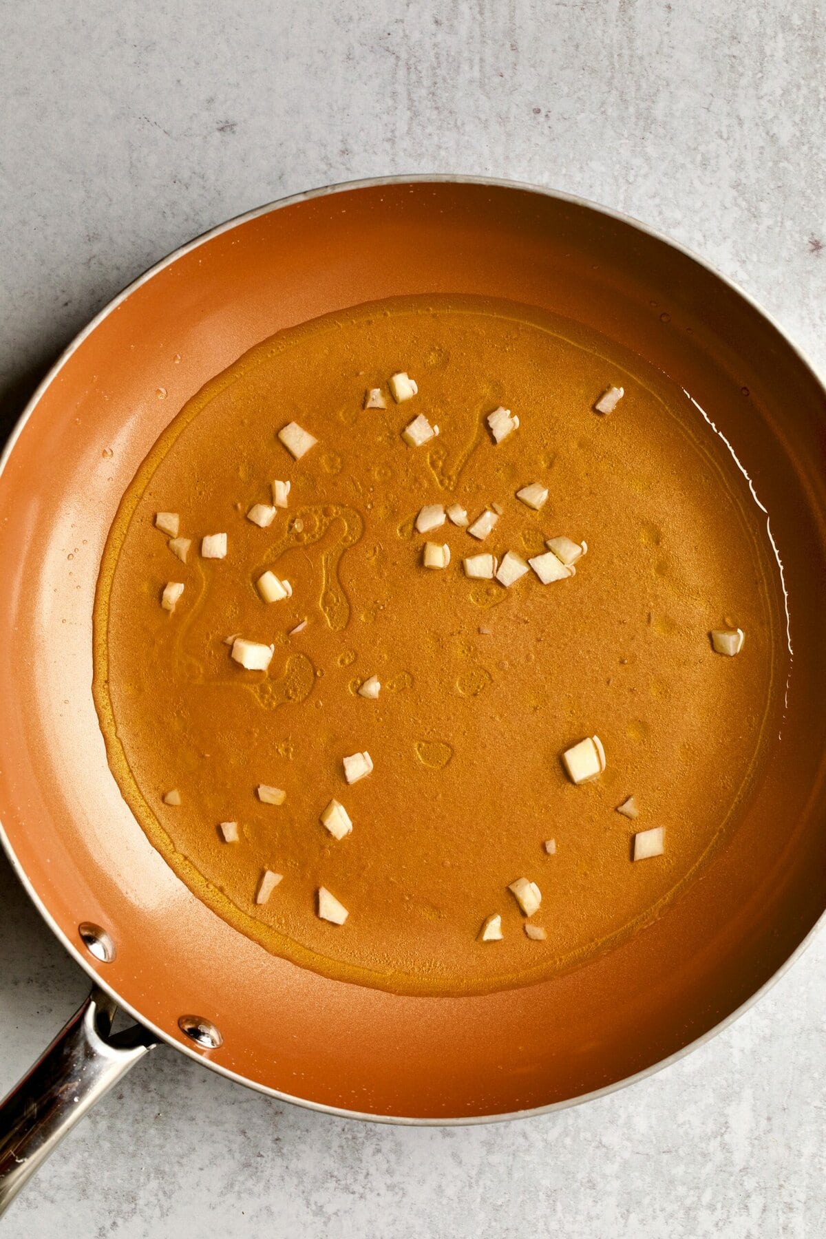 instructions for black truffle cream sauce: sautéing oil and garlic