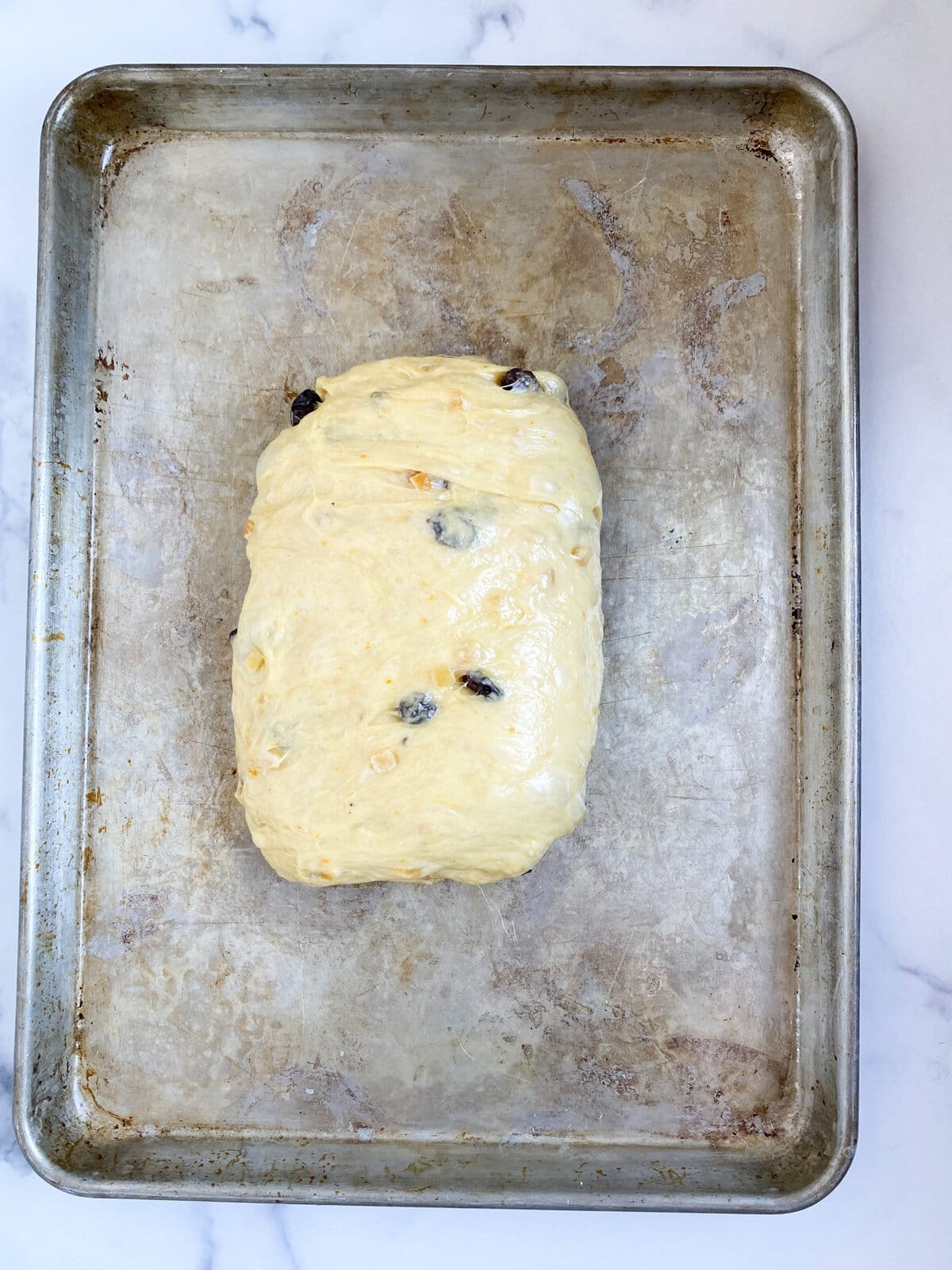 Process for making panettone: folding the dough.