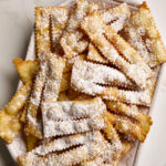 Large tray of chiacchiere di carnevale.