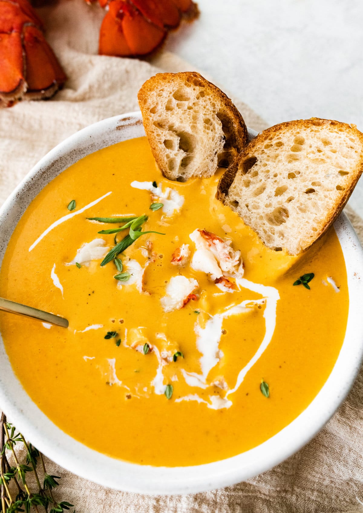 Classic lobster bisque in a bowl to serve with flounder
