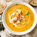 White bowl of lobster bisque.