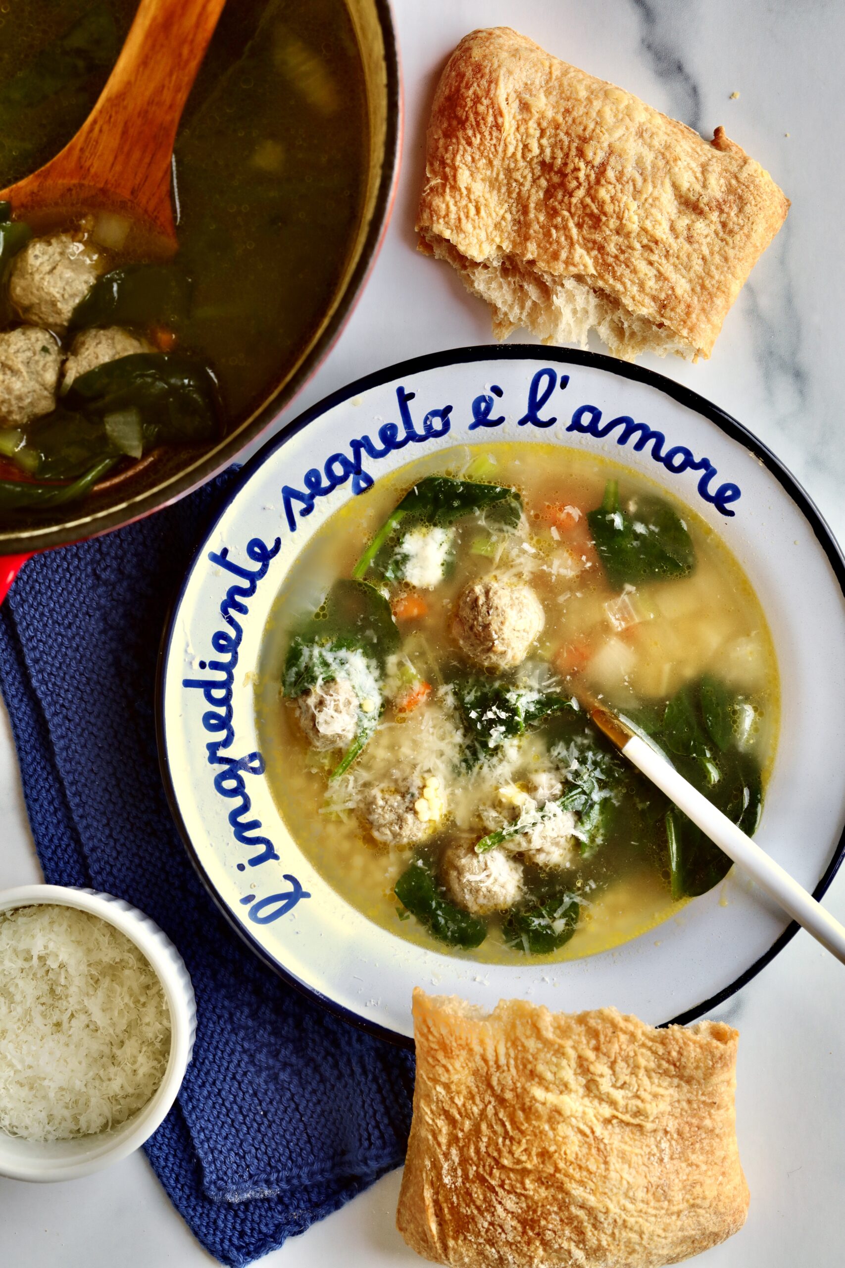 Classic Italian Wedding Soup Recipe bowl of soup and pot of soup with fresh made bread. 