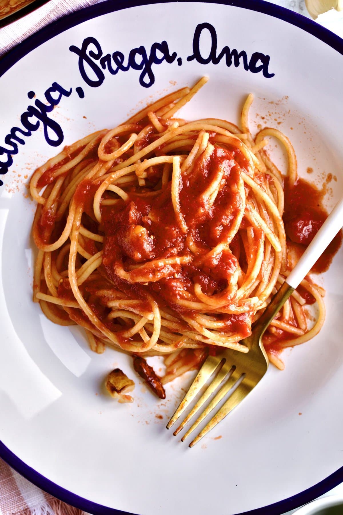 close up of the Best Arrabbiata Sauce Recipe (Spicy Spaghetti Sauce) in a blue and white serving bowl.