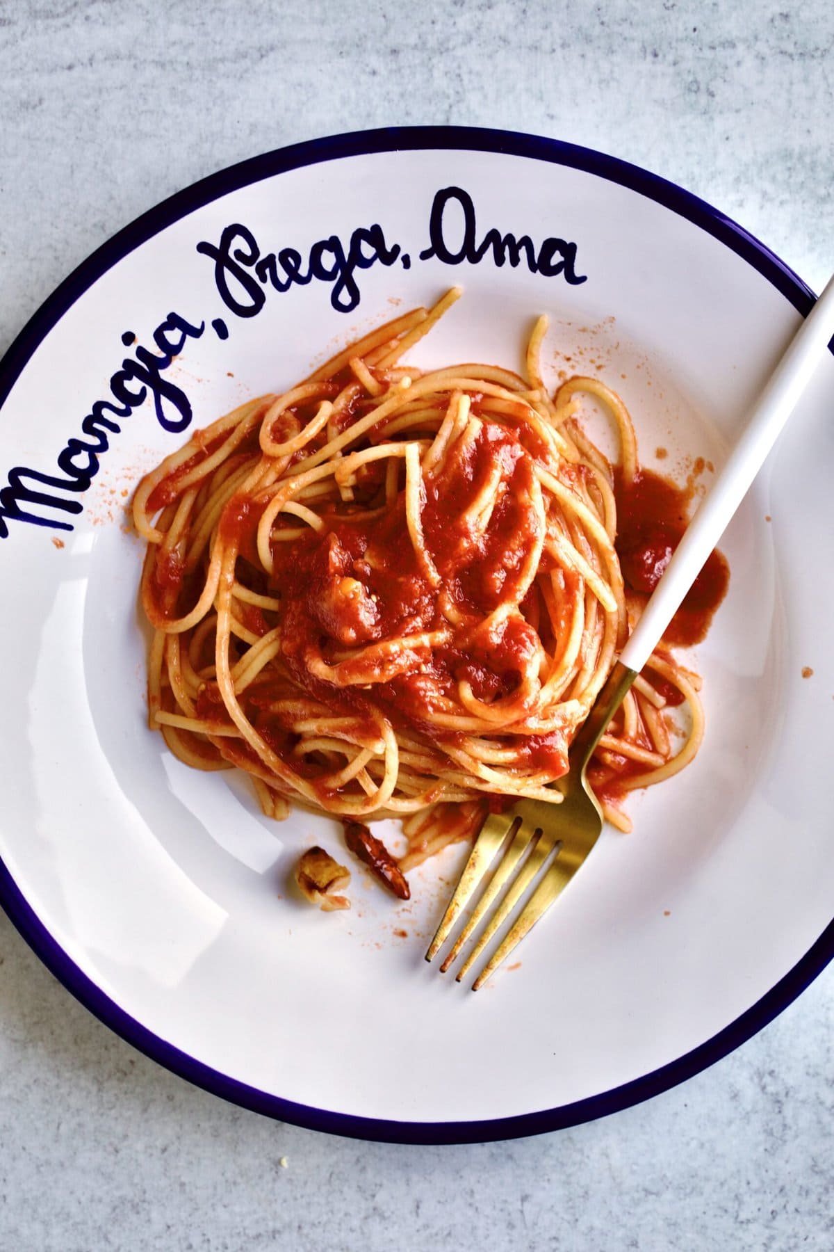 close up of the Best Arrabbiata Sauce Recipe (Spicy Spaghetti Sauce) in a blue and white serving bowl.