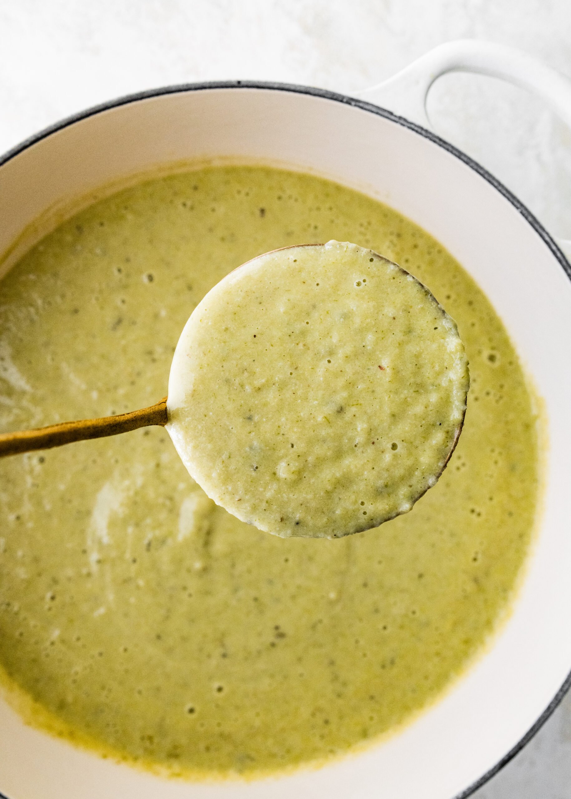 process of making No Potato Leek Soup Recipe- soup after blended with the immersion blender.