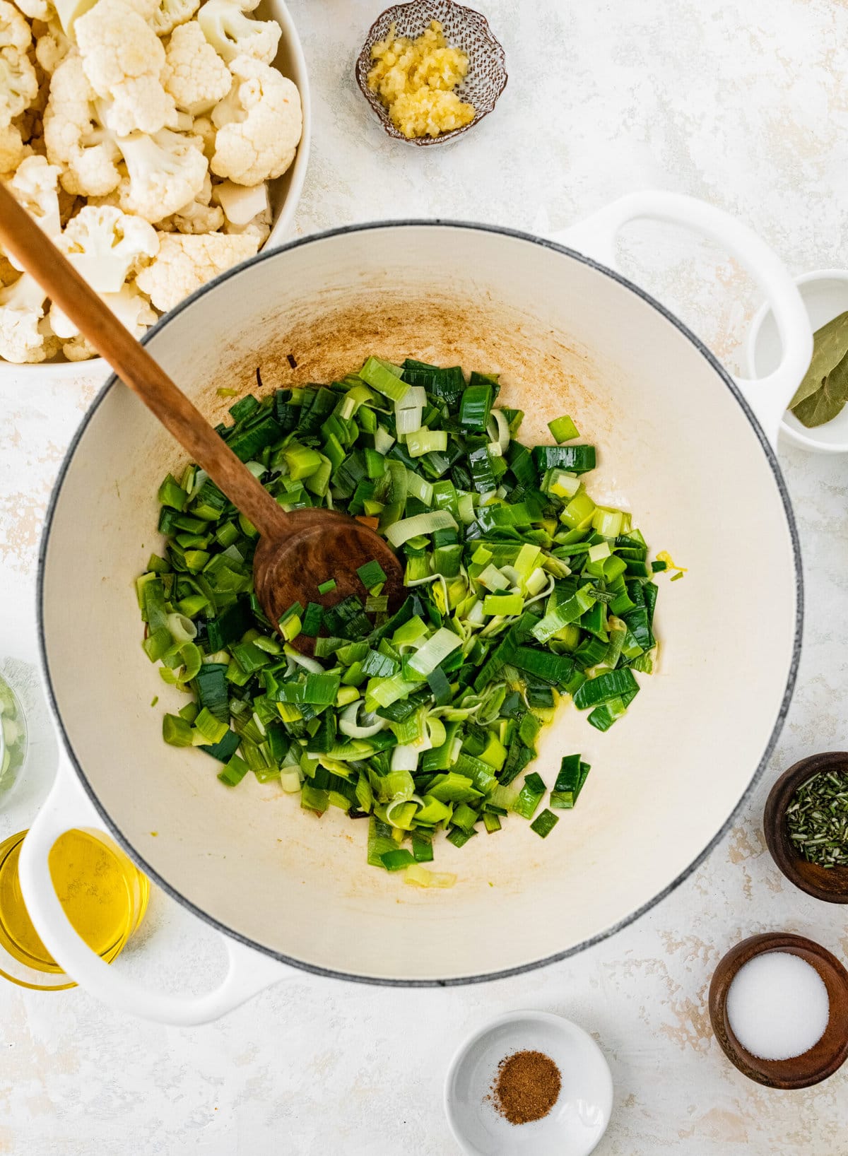 process of making No Potato Leek Soup Recipe- cooking leeks and stirring.