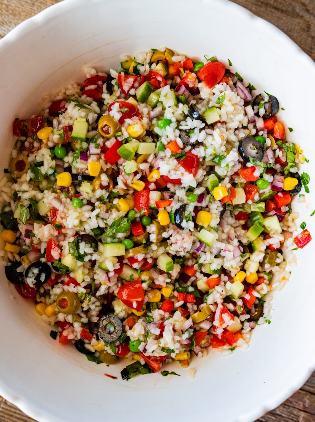 How to Make- Italian Rice Salad Recipe (Insalata Di Riso)- all the ingredients mixed in the bowl and salad ready to serve.