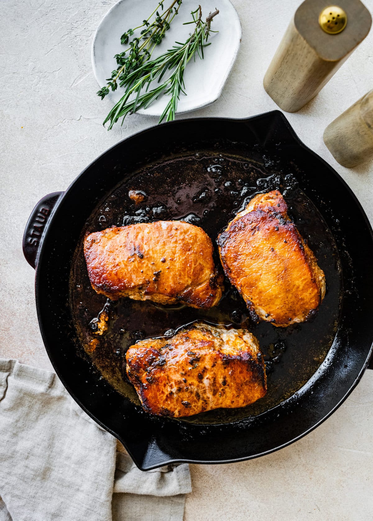 Step-by-step photos for How to cook thick pork chops- finish cooking pork chops in oven until perfectly cooked. 