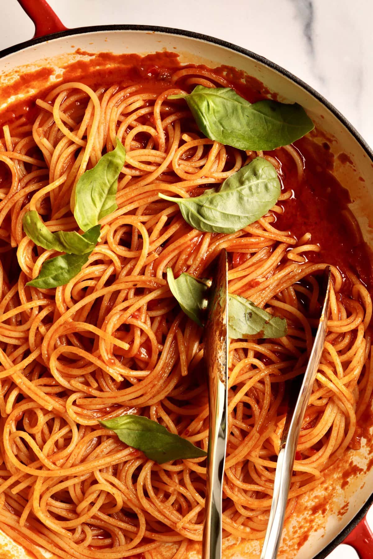 How to make: Quick Tomato Paste Pasta Sauce Recipe with Spaghetti- add the al dente pasta to the pan with the pasta sauce and stir to combine. Add fresh basil and toss.