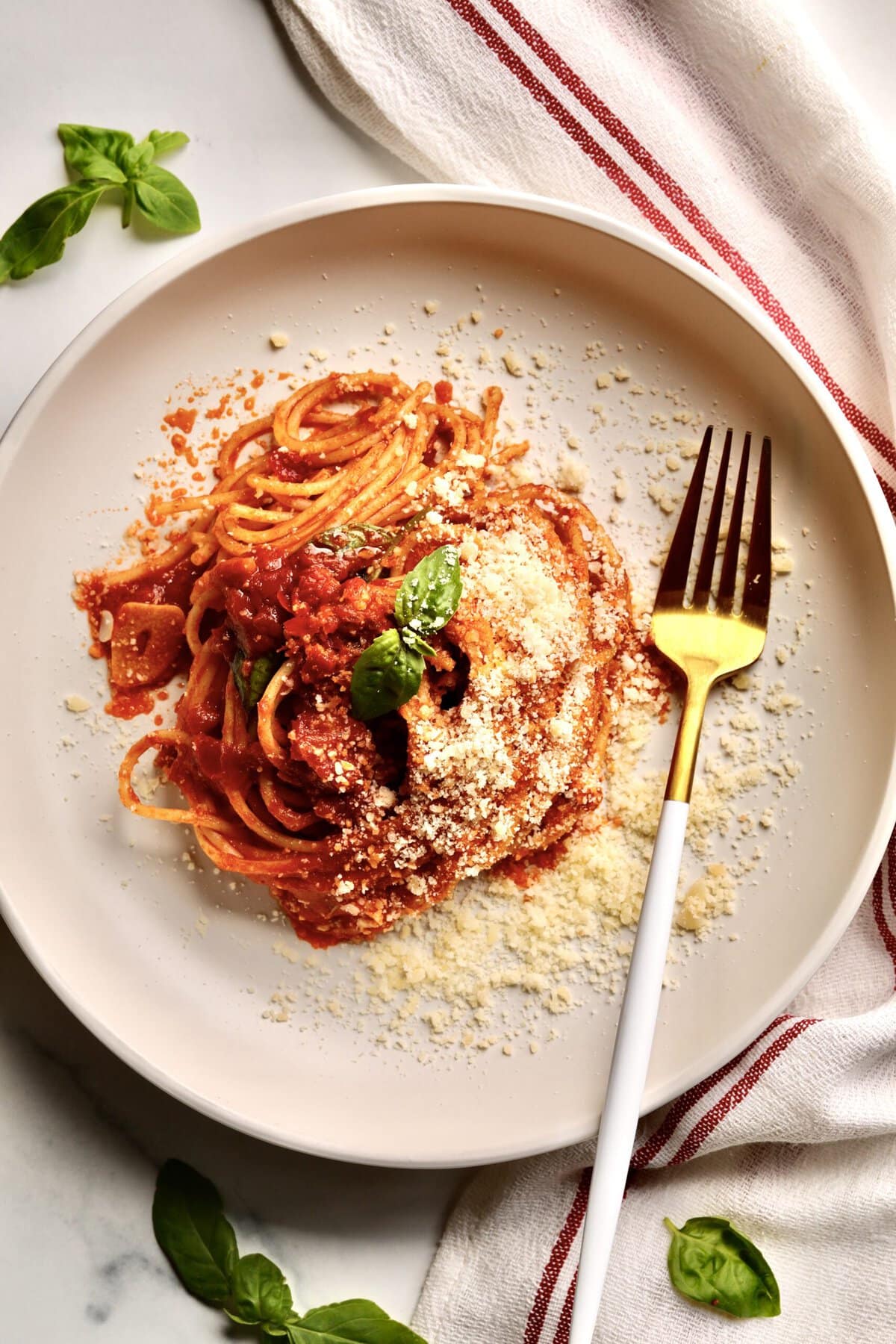 Quick Tomato Paste Pasta Sauce Recipe with Spaghetti on a plate with a fork.