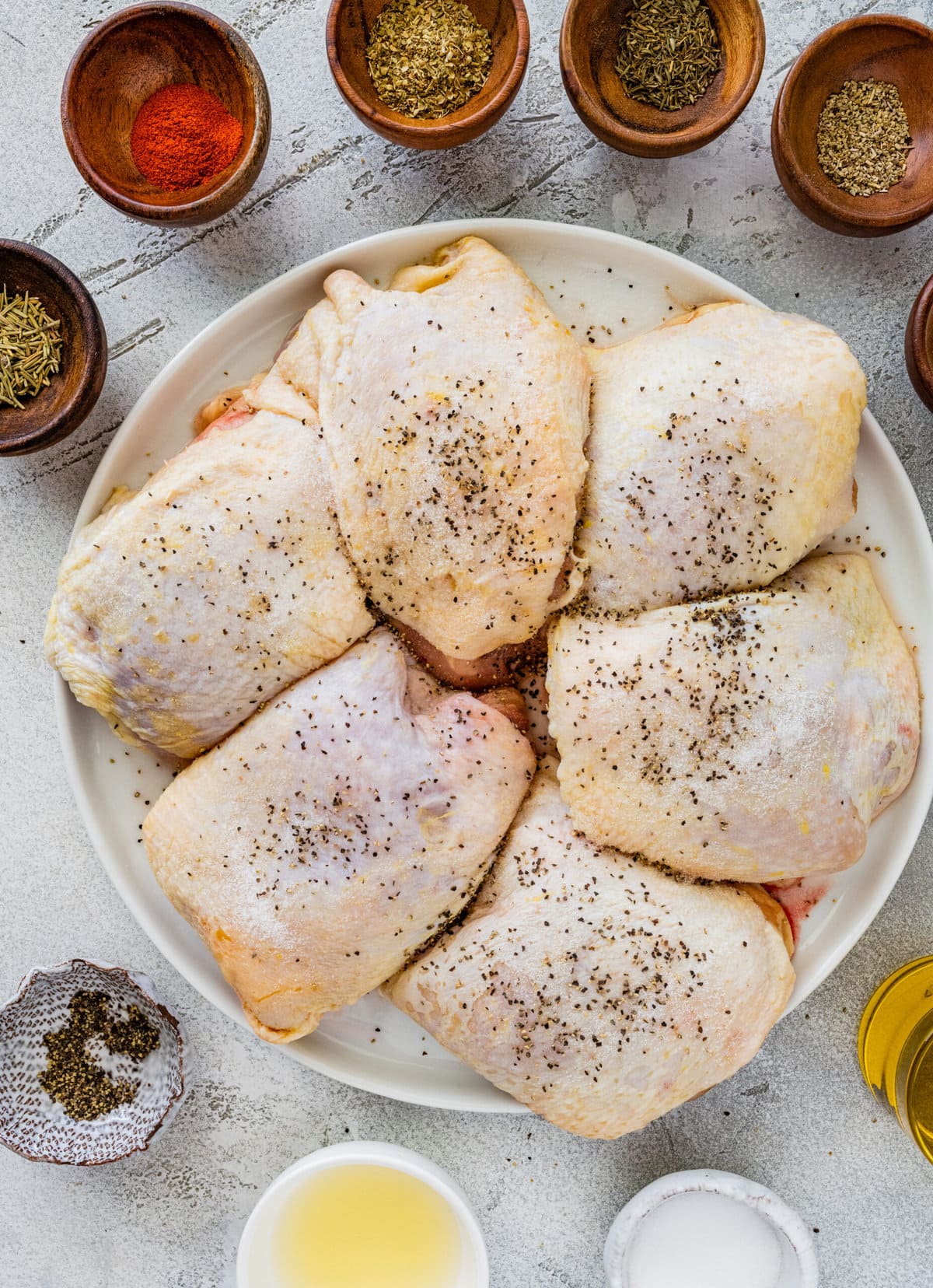 How Long to Bake Chicken Thighs at 375 (Best Recipe)- season with salt and pepper.