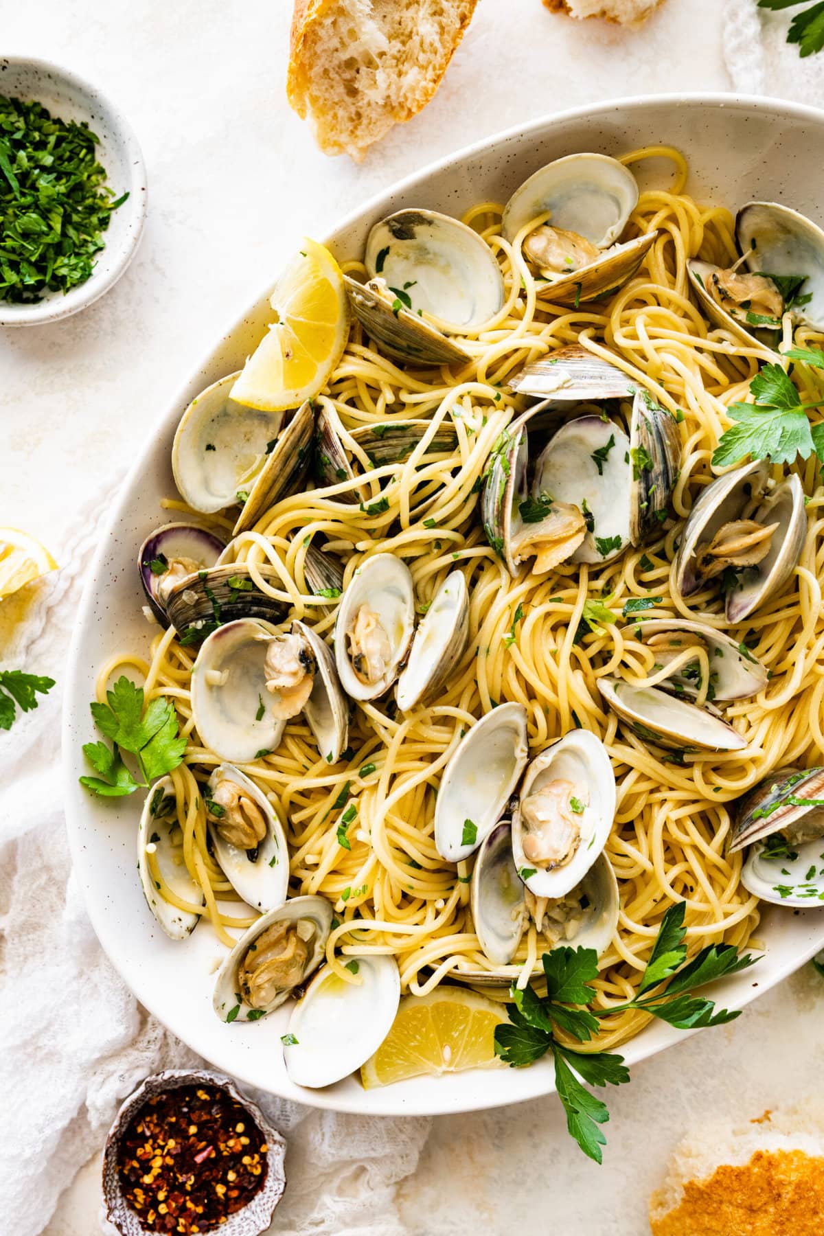 Spaghetti alle vongole on a large serving platter.