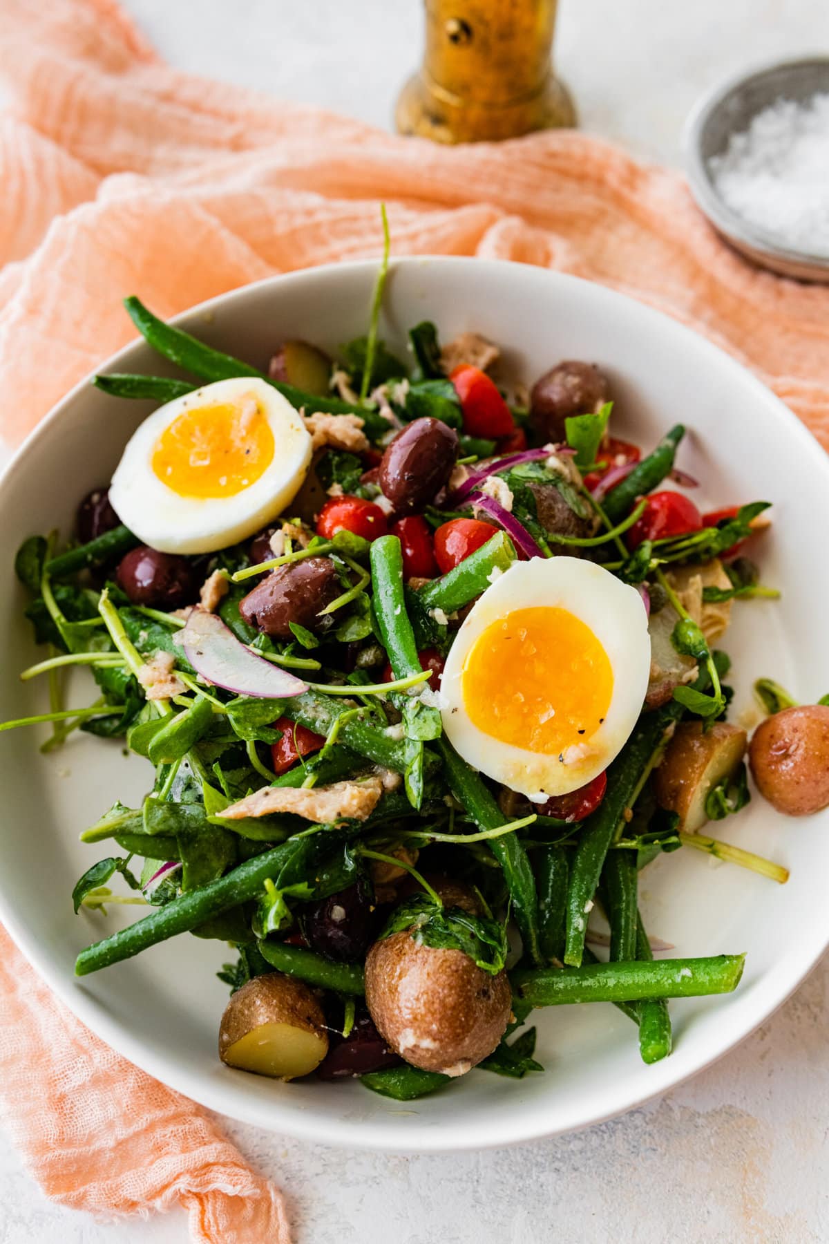 salad in a white bowl ready to eat.