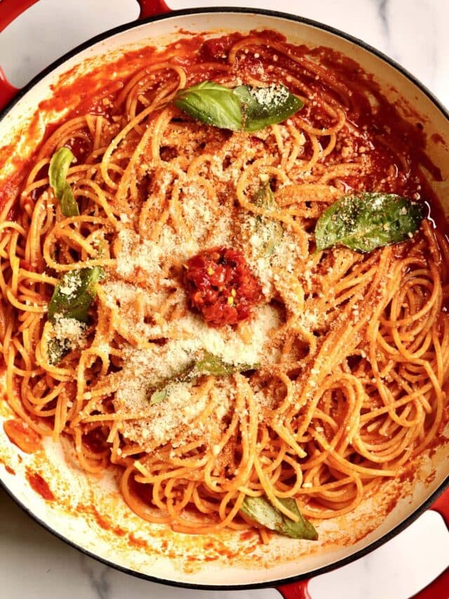 How to make: Quick Tomato Paste Pasta Sauce Recipe with Spaghetti- add the al dente pasta to the pan with the pasta sauce and stir to combine. Add fresh basil and toss. Add extra cheese and Calabrian chili paste if desired.