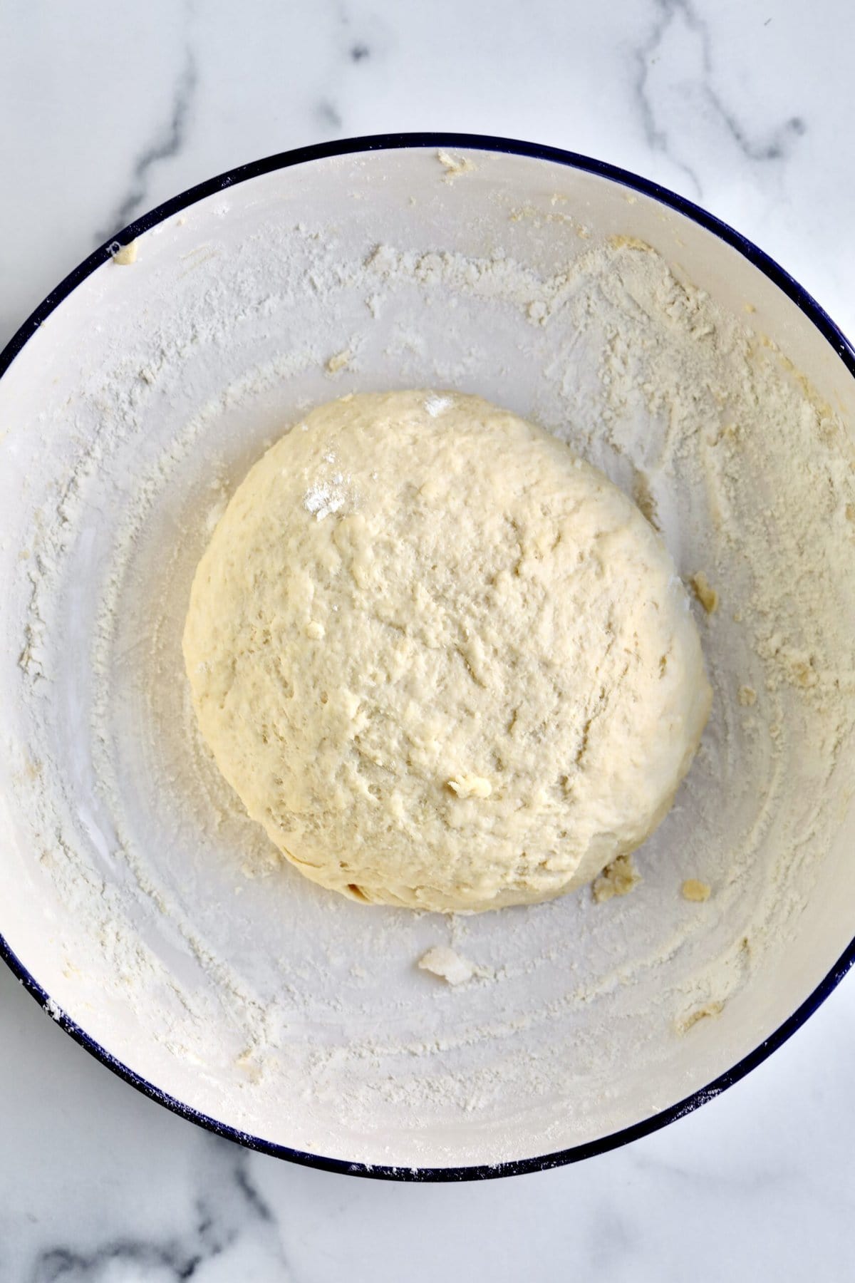 How to make Sardinian Pardulas Recipe- mix wet and dry ingredients and make a smooth dough ball. Let rest for 1 hour.