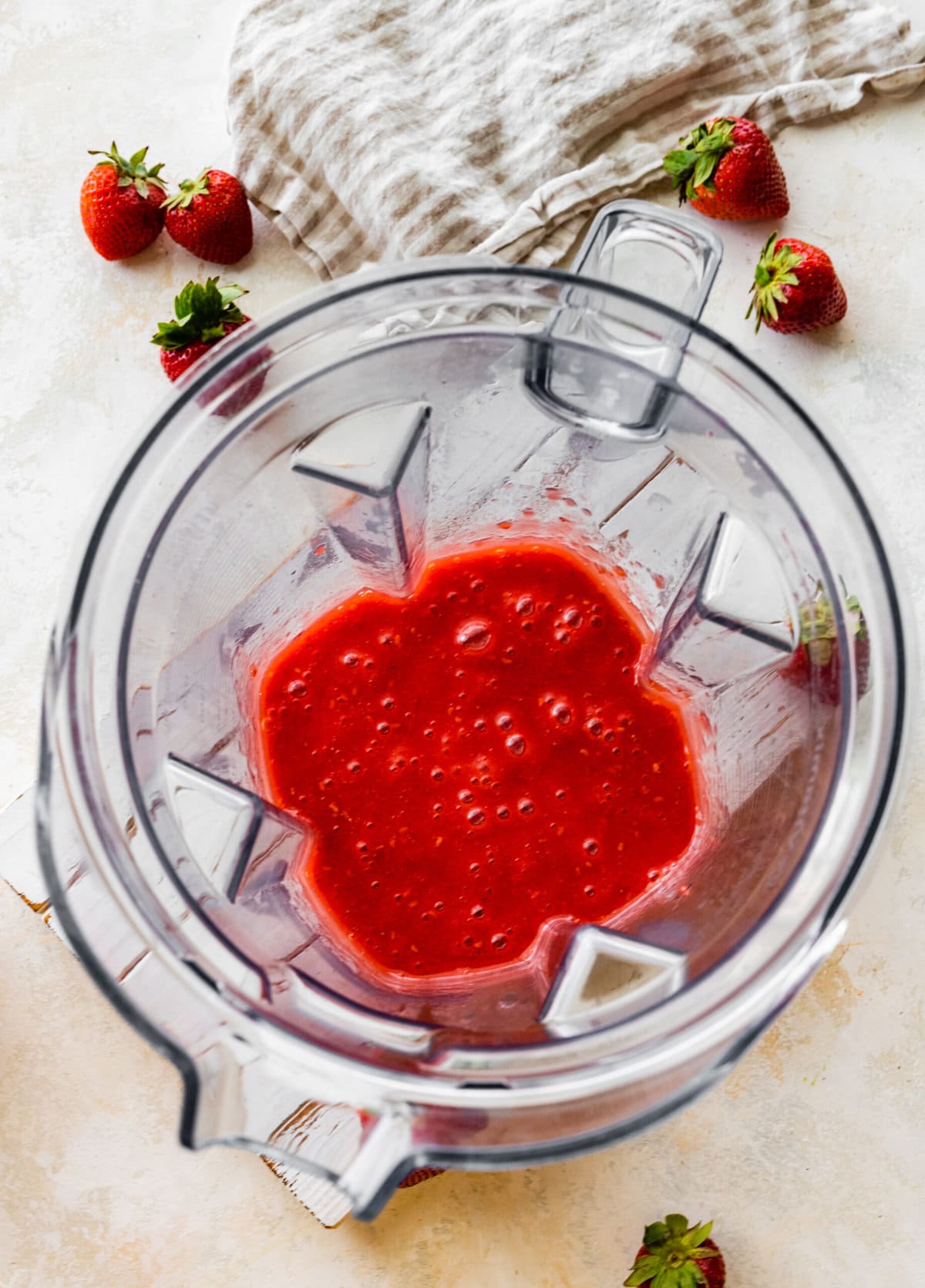 Making the berry puree. Blending cooked berries.