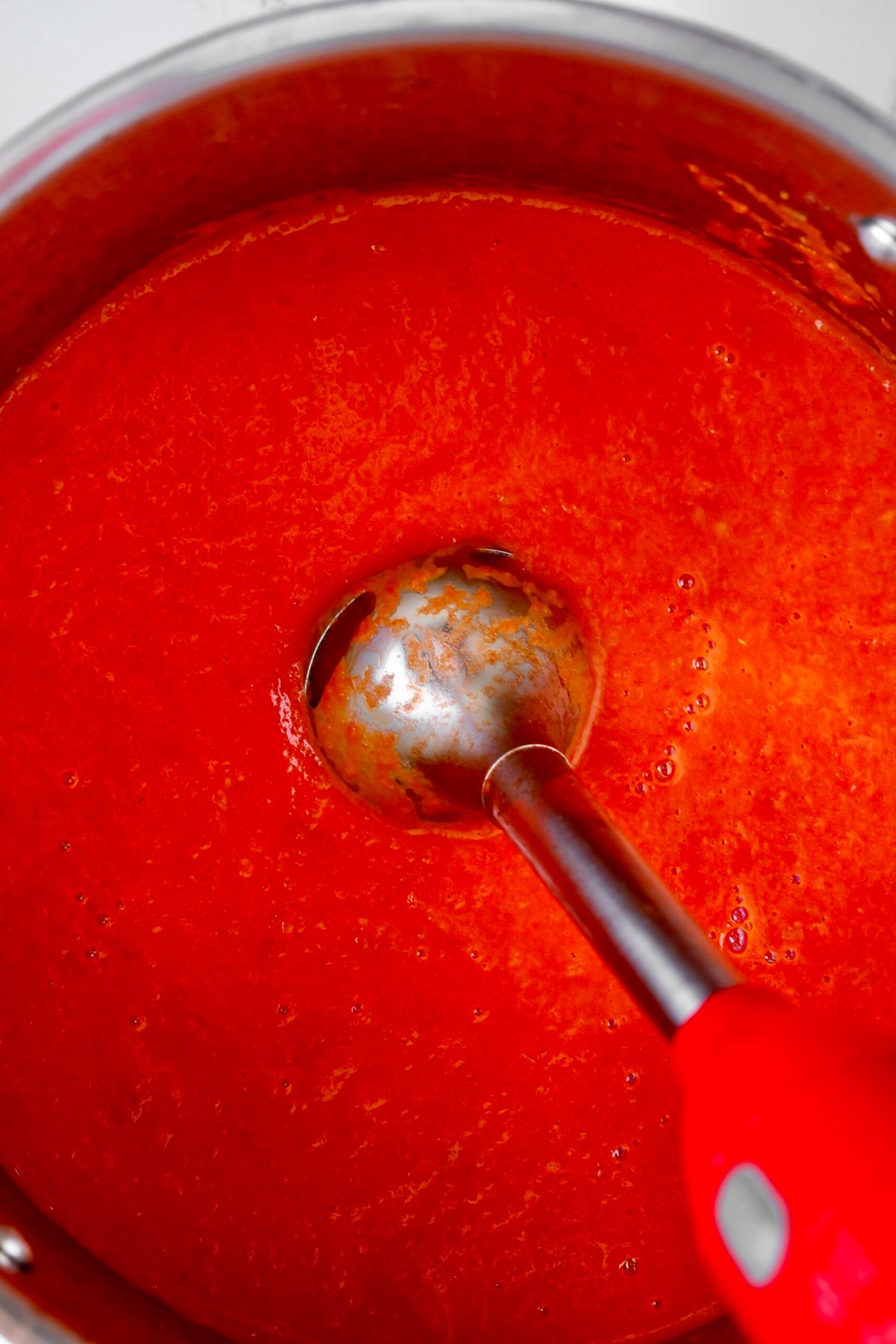 How to Homemade Marinara Sauce Recipe with Fresh Tomatoes- let tomatoes and onions sew for 30 minutes then blend with immersion blender.