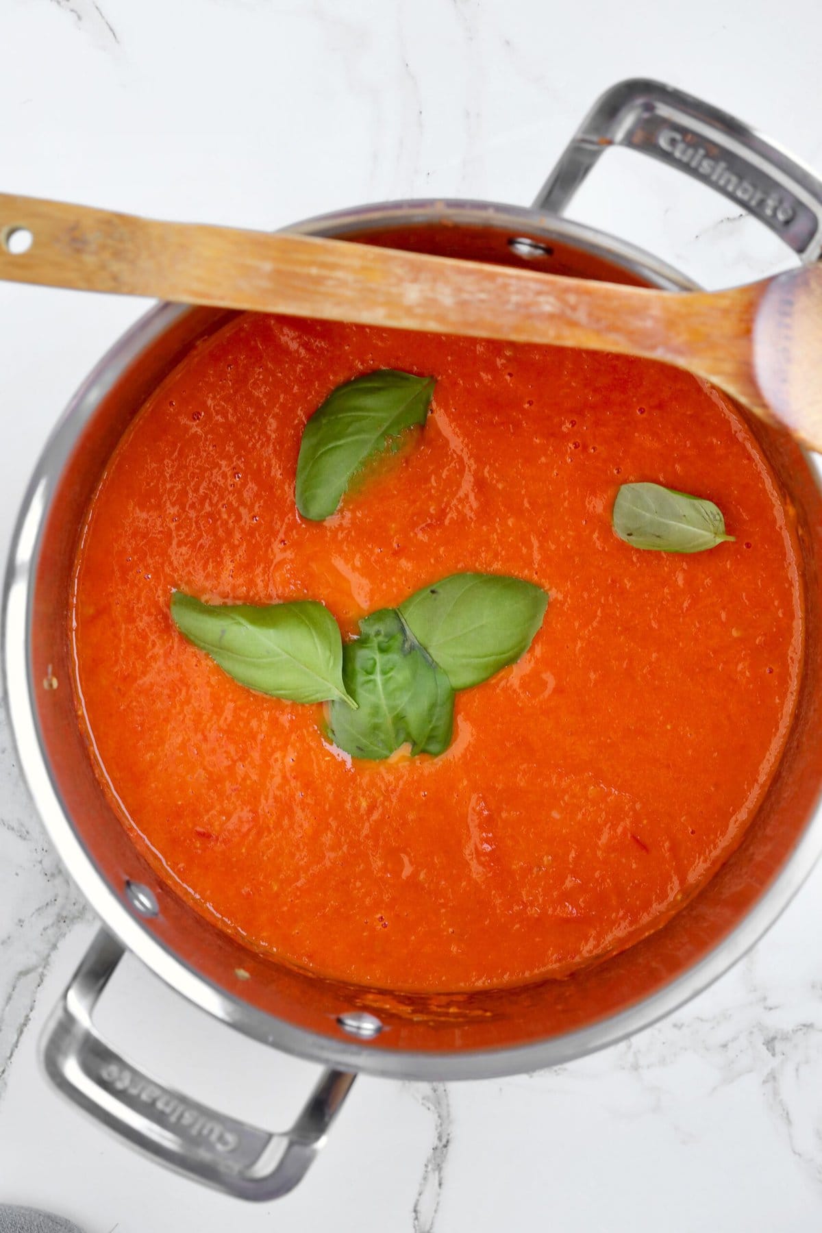 How to Homemade Marinara Sauce Recipe with Fresh Tomatoes- let tomatoes and onions sew for 30 minutes then blend with immersion blender. Add basil.