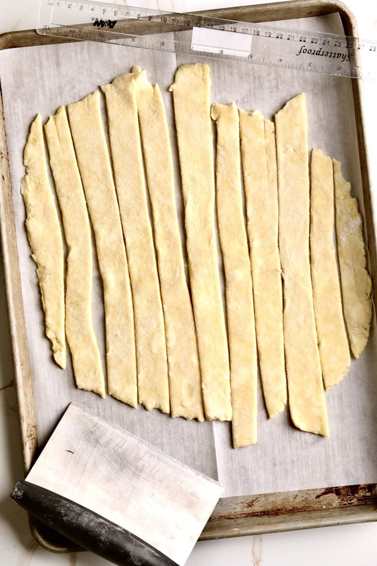 How to make fresh peach pie recipe step-by-step: top crust cutting in strips for lattice top.