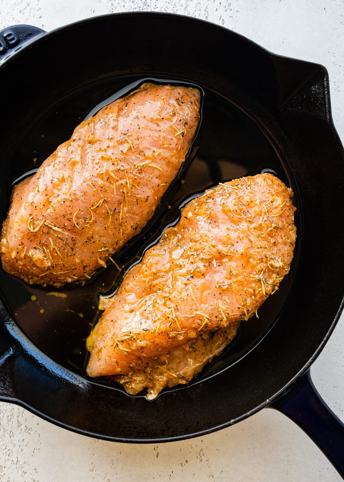 How to make Baked Turkey Tenderloin Step-by-Step: searing the tenderloin on both sides then baking in the oven.