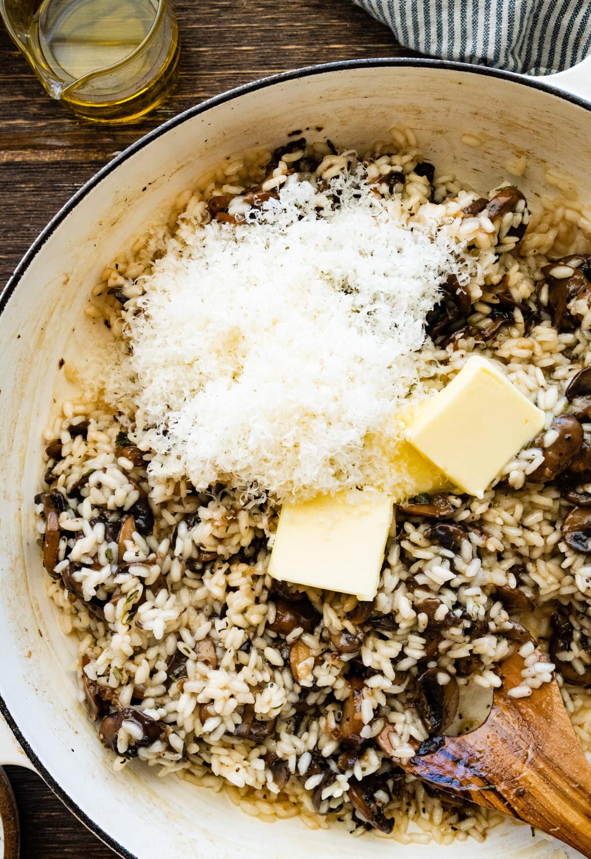 How to Make Creamy Mushroom Risotto Instructions- add parmigiano and butter.