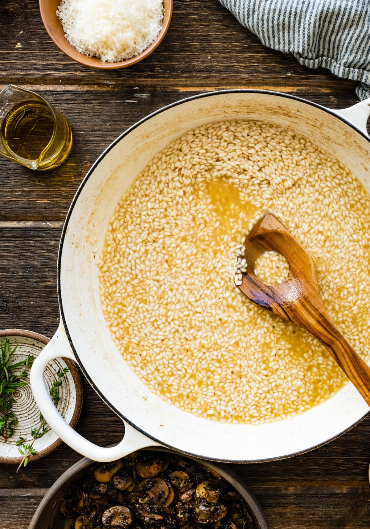 How to Make Creamy Mushroom Risotto Instructions- add the liquid to the risotto a little bit at a time.