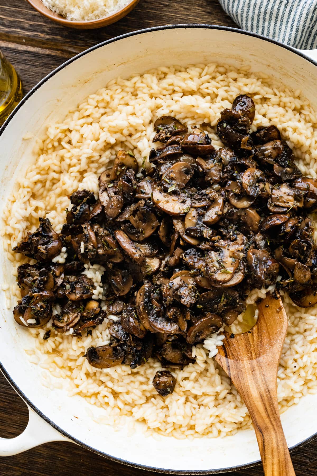 How to Make Creamy Mushroom Risotto Instructions- add mushrooms to the risotto.