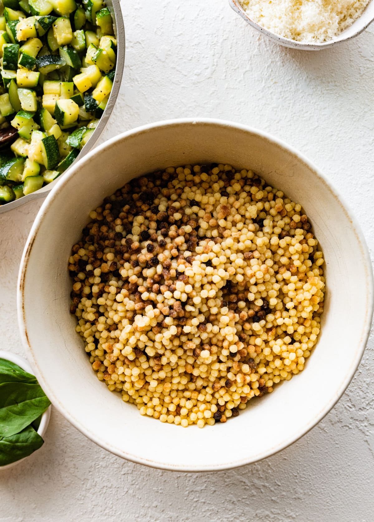 Step by step instructions Fregola Sarda Pasta Recipe with Zucchini and Cheese- cook fregola al dente.
