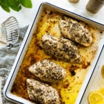 How Long to Bake Chicken Breast at 425 (Easy Recipe)- in a white baking dish ready to eat.