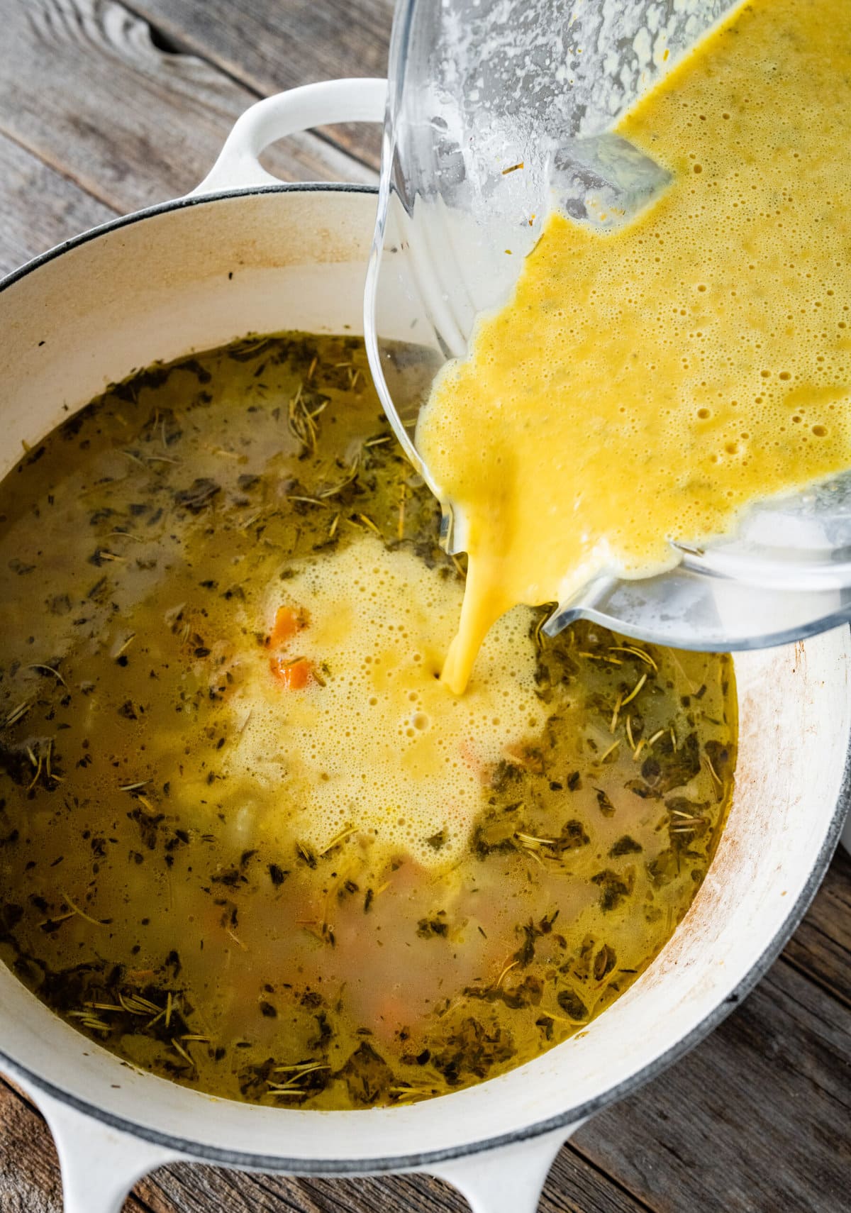 How to make Tuscan White Bean Soup Instructions- pour blended portion back into the soup.