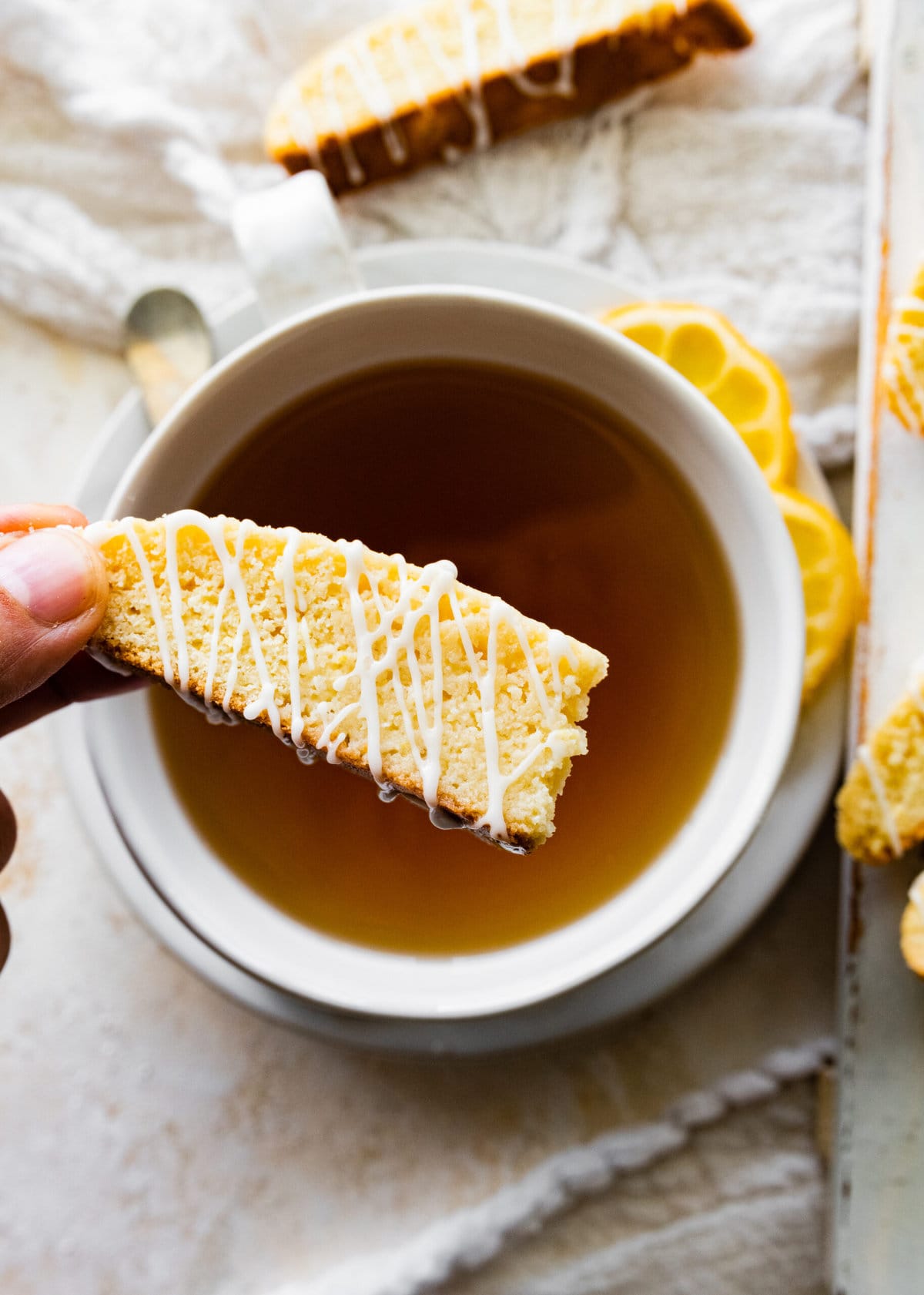 dipping the biscotti on the tea.