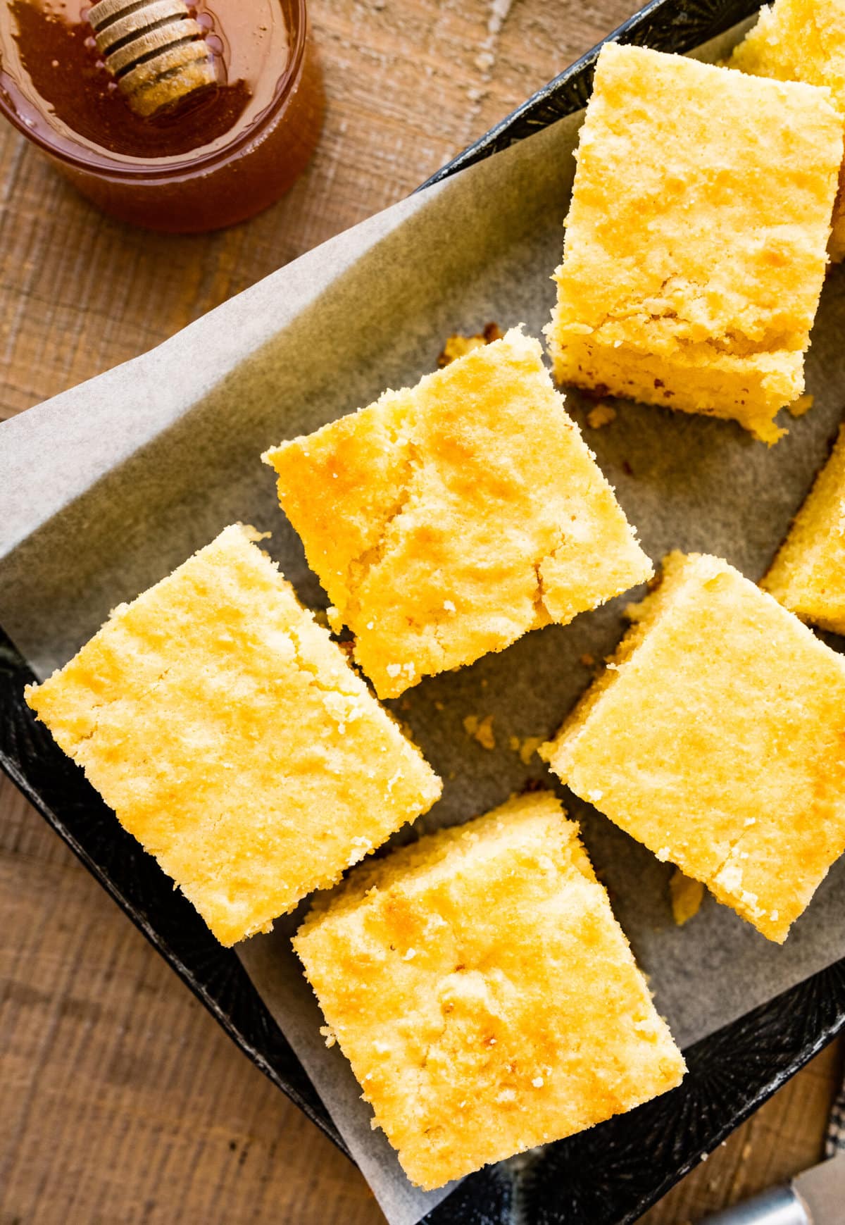 plated square slices of the best sweet cornbread recipe.