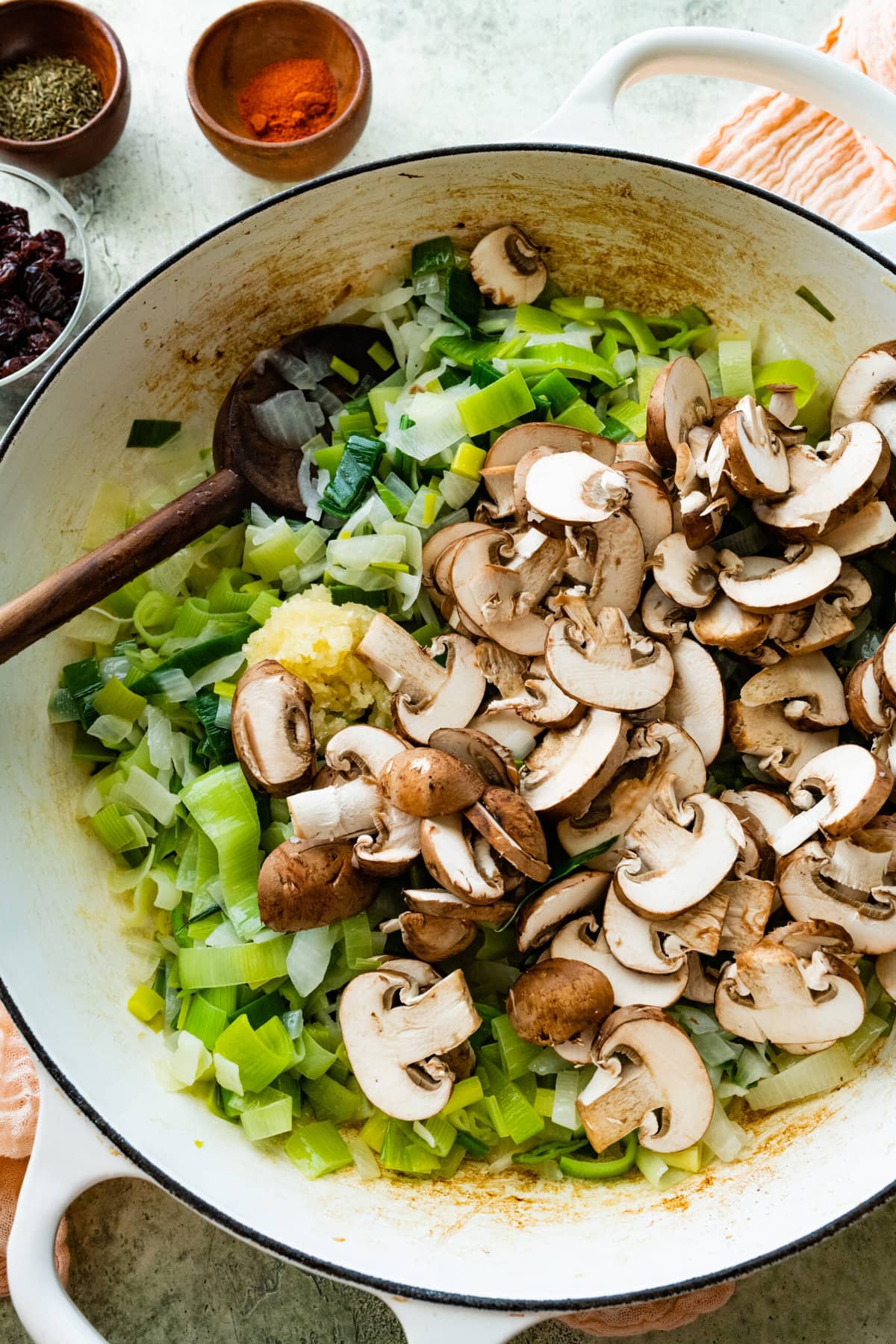 How to make Butternut Squash Casserole Recipe Vegetarian Step-by- Step: adding the mushrooms to the pot.